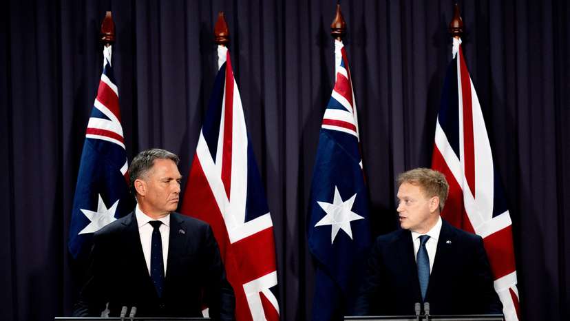 British Defence Secretary Shapp and Australian Deputy Prime Minister and Minister for Defence Marles sign a new defence and security cooperation agreement, in Canberra