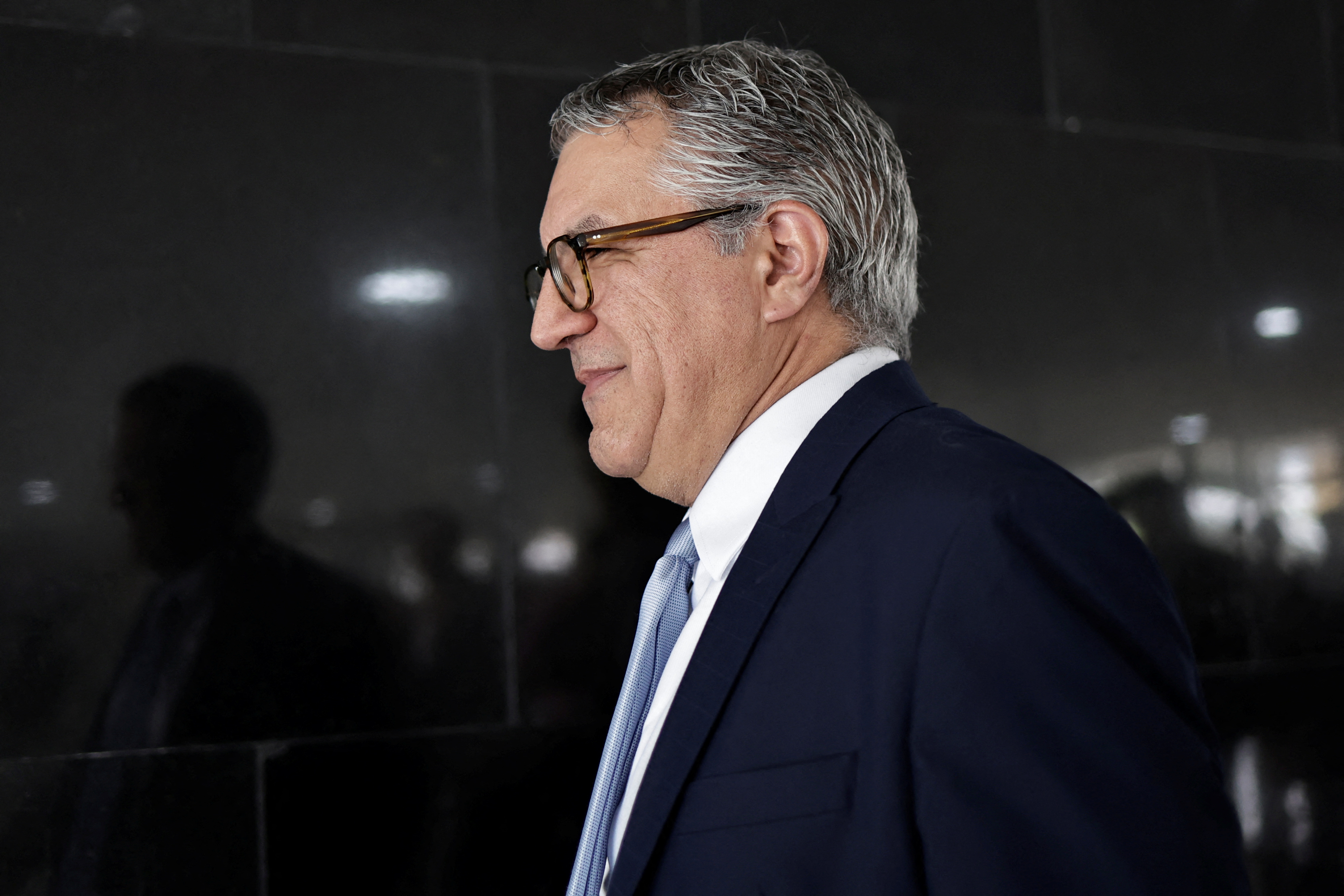 Brazil's Minister of Institutional Relations Alexandre Padilha walks after a news conference in Brasilia