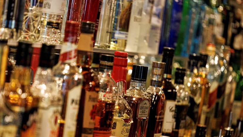 FILE PHOTO: Bottles of alcoholic drinks are displayed at the Sausalitos bar in Munich