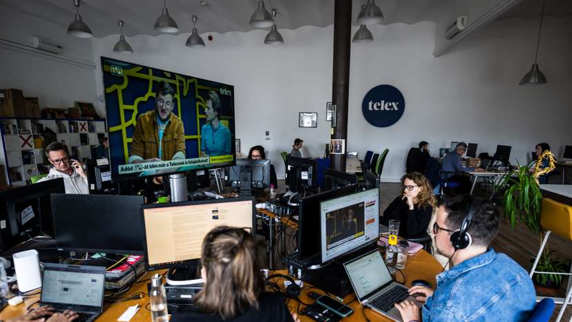 Journalists of the independent news outlet Telex work at their newsroom in Budapest