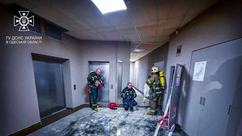 Rescuer work at the site damaged by the debris of a downed drone