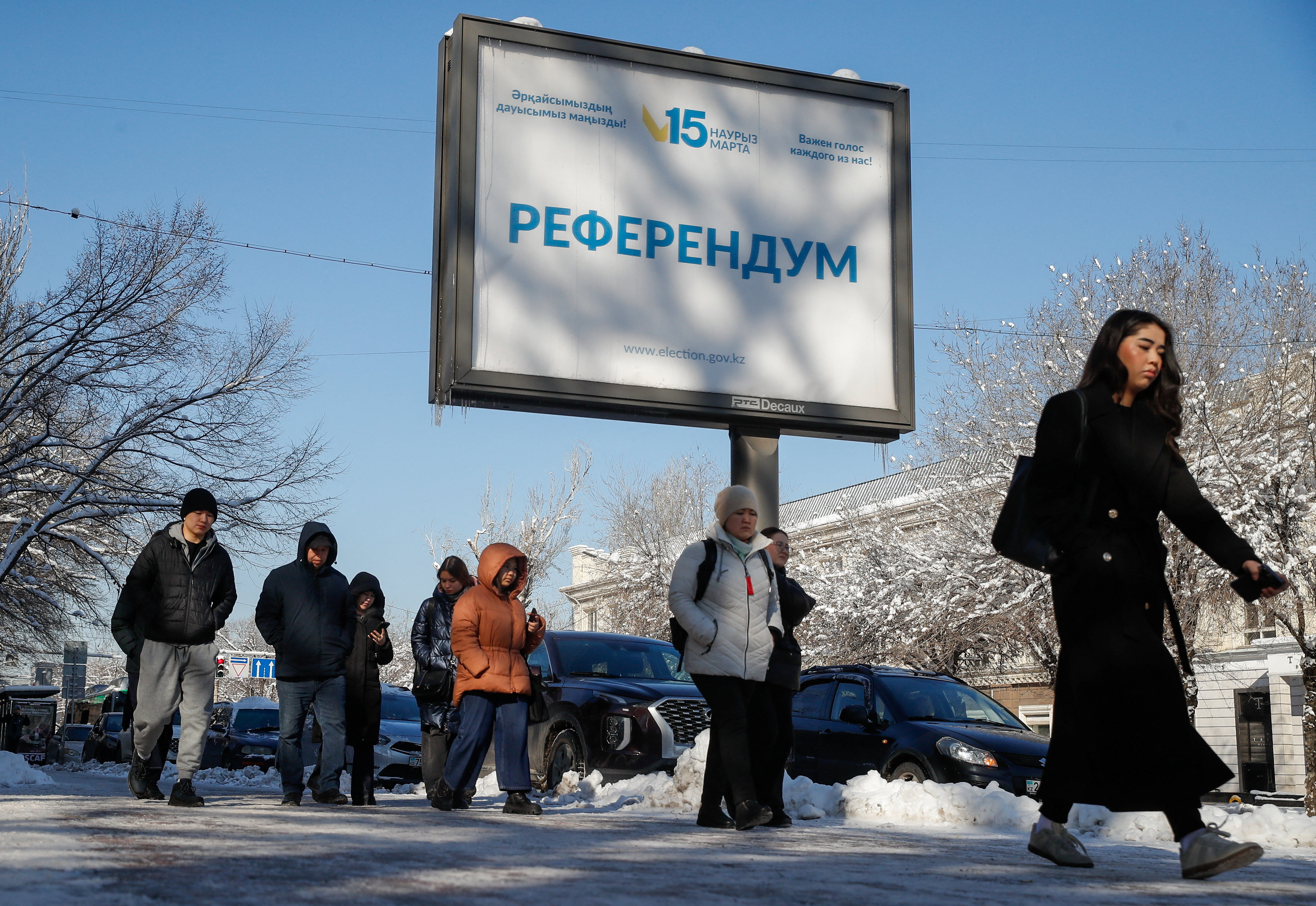 Campaign posters for referendum on a new constitution in Almaty