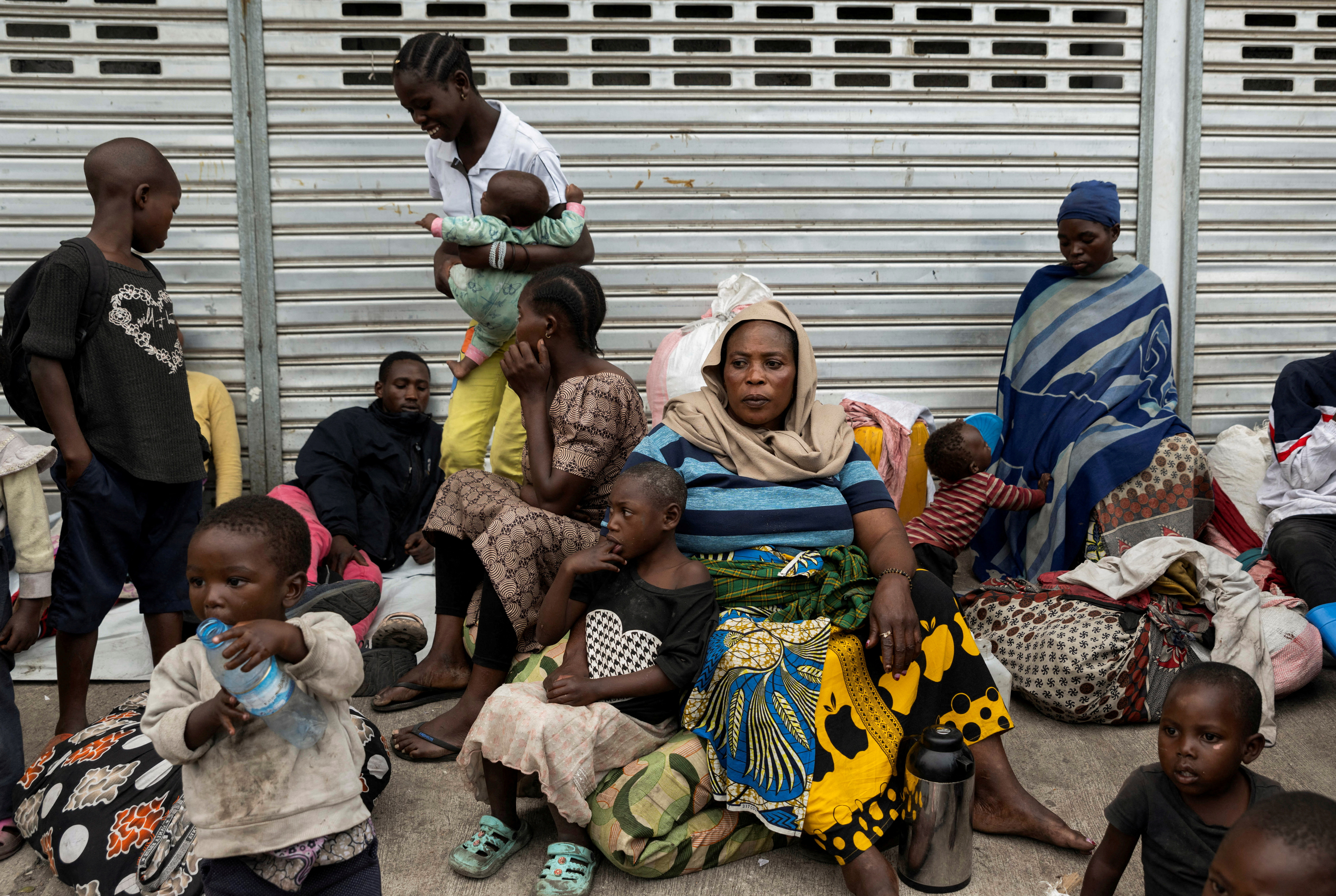 FILE PHOTO: Colleta Nzabonipa, 54, sits among other internally displaced people who fled from various camps following fighting between M23 rebels and the Armed Forces of the Democratic Republic of the Congo (FARDC), in Goma