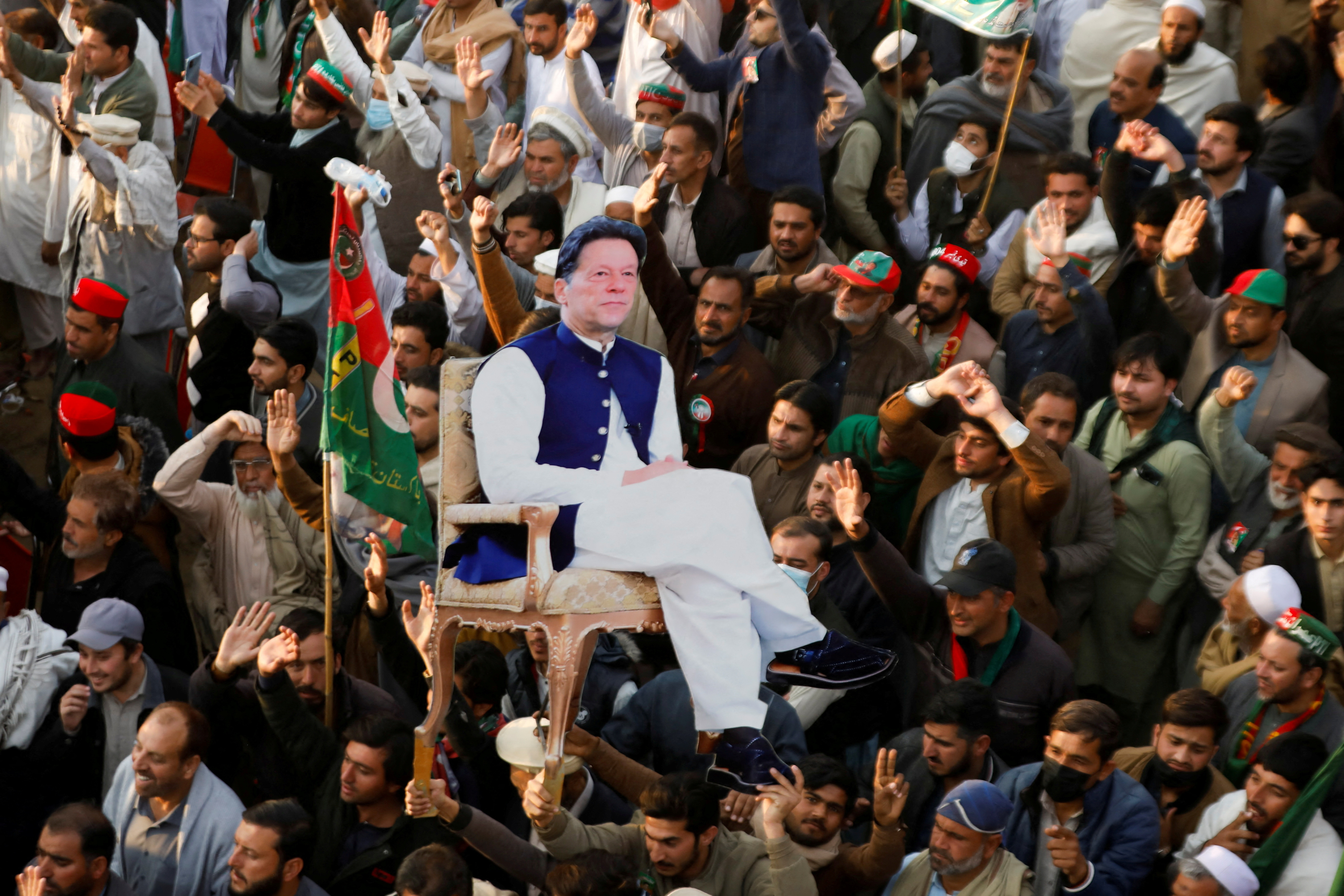 FILE PHOTO: Supporters of the former Pakistani Prime Minister Imran Khan protest against what they call a black day during a rally in Swabi