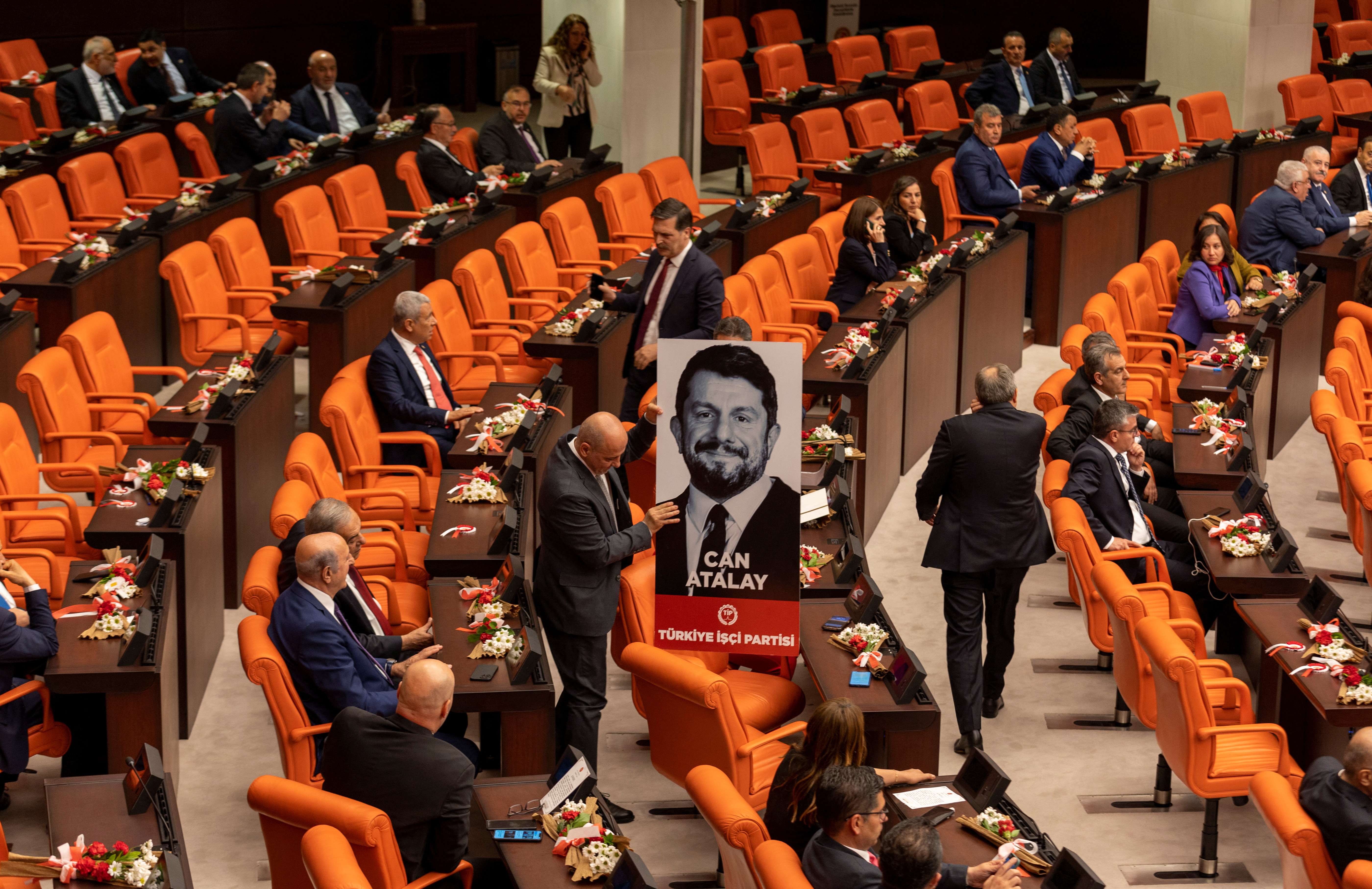 Workers' Party of Turkey MPs display portrait of jailed Atalay in parliament in Ankara