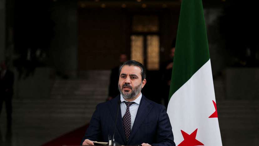 Ukrainian Foreign Minister Andrii Sybiha attends a press conference with Syria's foreign minister, Asaad Hassan al-Shibani, after the ousting of Syria's Bashar al-Assad, in Damascus