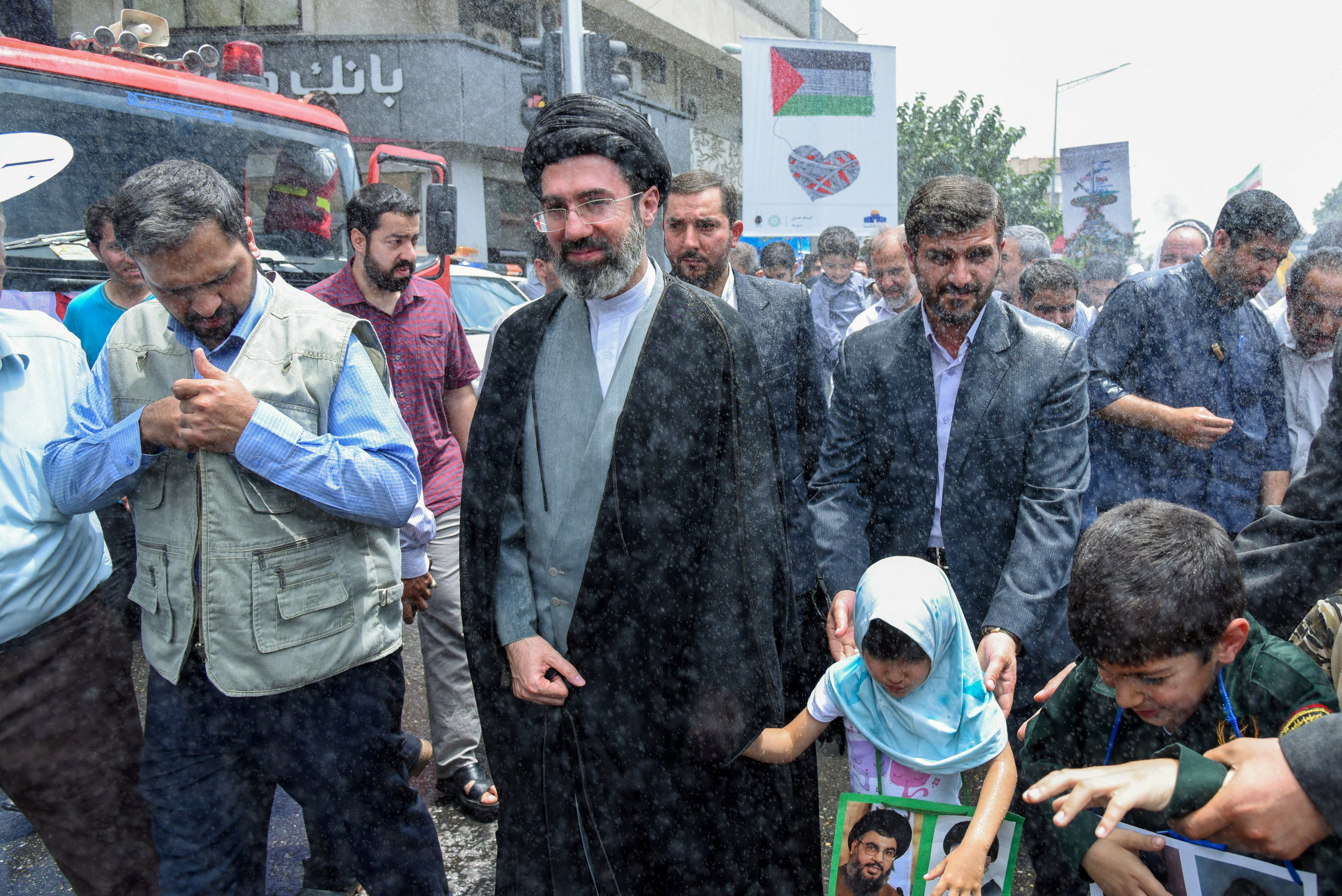 FILE PHOTO: Iran’s new supreme leader, Mojtaba Khamenei, the second son of late Iran's Supreme Leader Ayatollah Ali Khamenei, attends a rally in Tehran