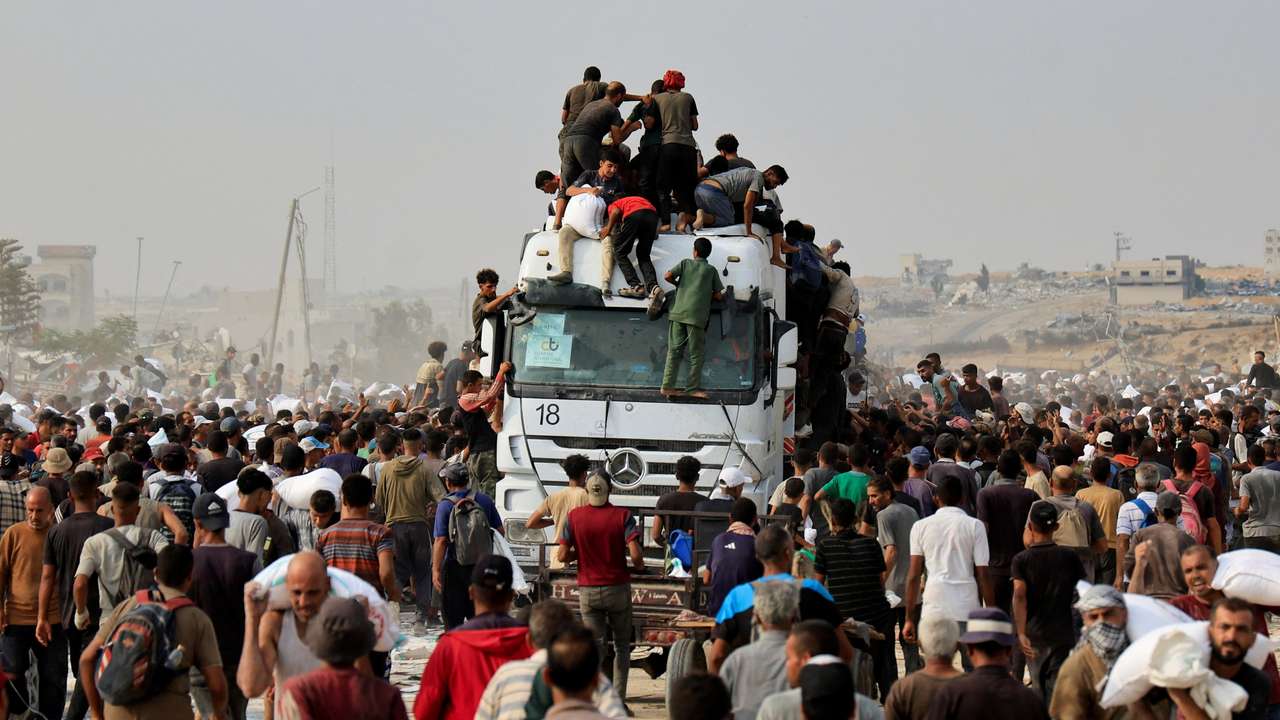 Palestinians seek aid supplies in Khan Younis, southern Gaza Strip