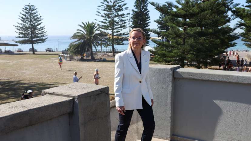 People visit the crime scene after it was reopened following the mass shooting at Bondi Beach