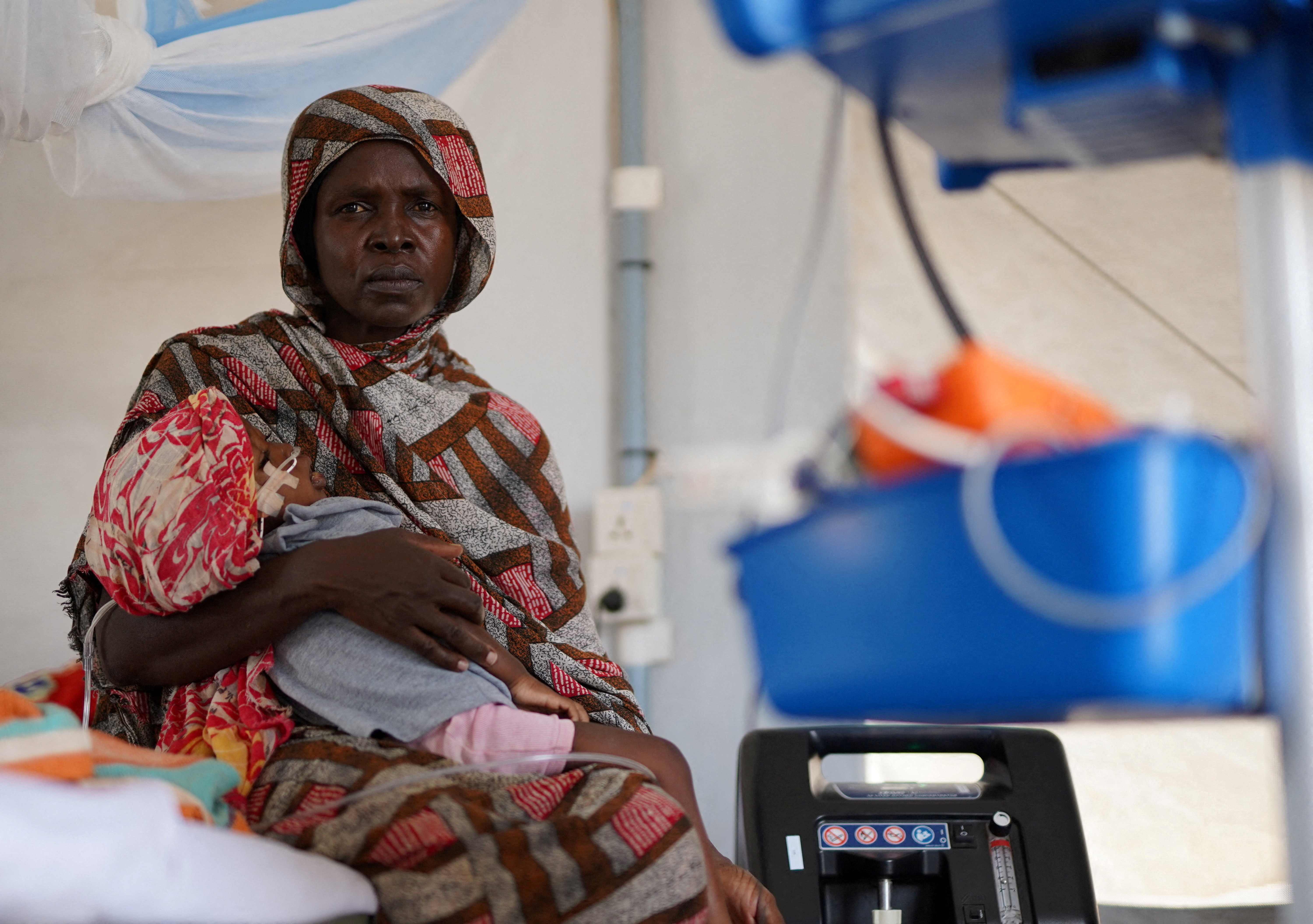 FILE PHOTO: Injured displaced Sudanese fleeing violence in al-Fashir and receiving treatment by Medecins Sans Frontieres (MSF) in Tawila