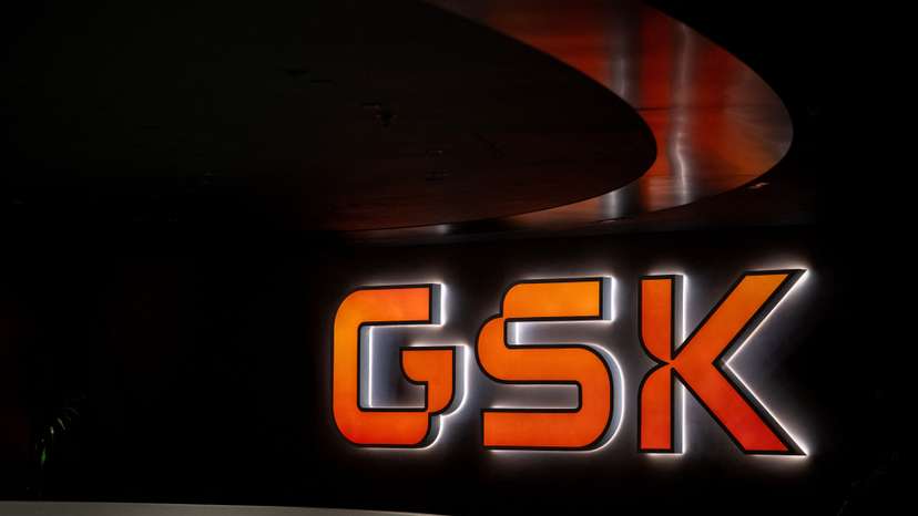 FILE PHOTO: Signage is pictured in the main lobby of GSK offices in London