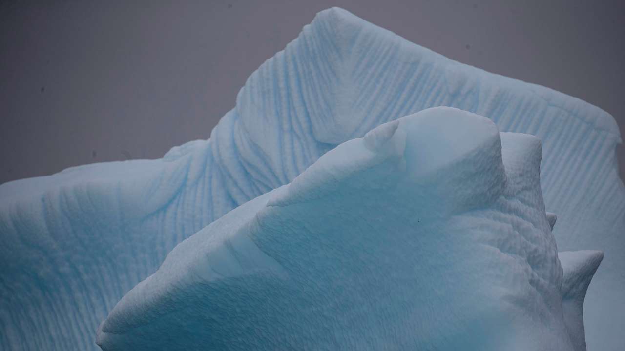 FILE PHOTO: An iceberg floats near Two Hummock Island, Antarctica