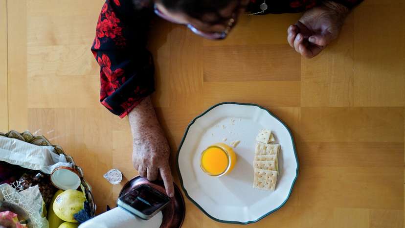 A couple with mixed immigration status takes part virtually in a service of the Lincoln United Methodist Church
