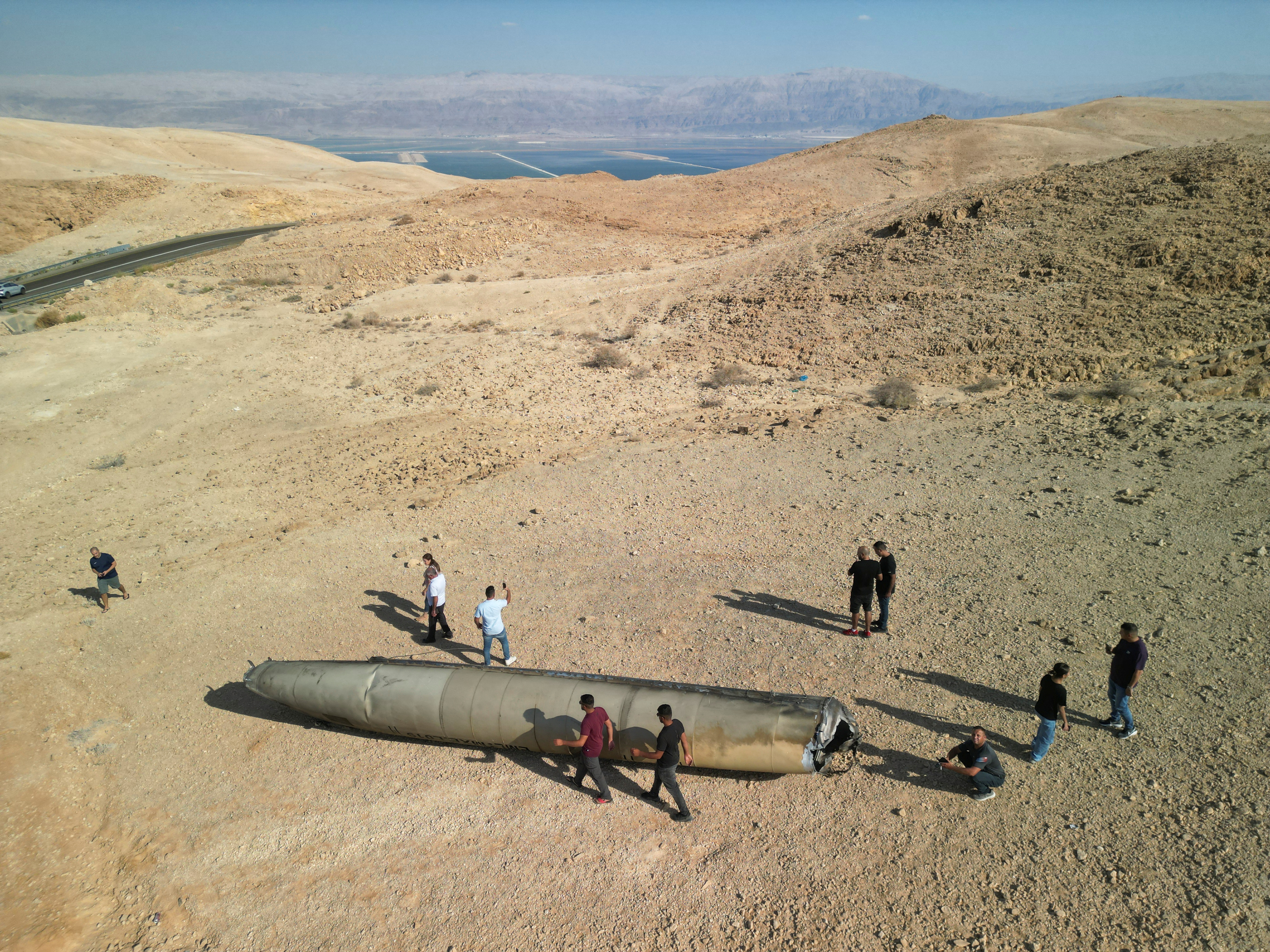 Remains of a ballistic missile lying in the desert, following an attack by Iran on Israel, near the southern city of Arad