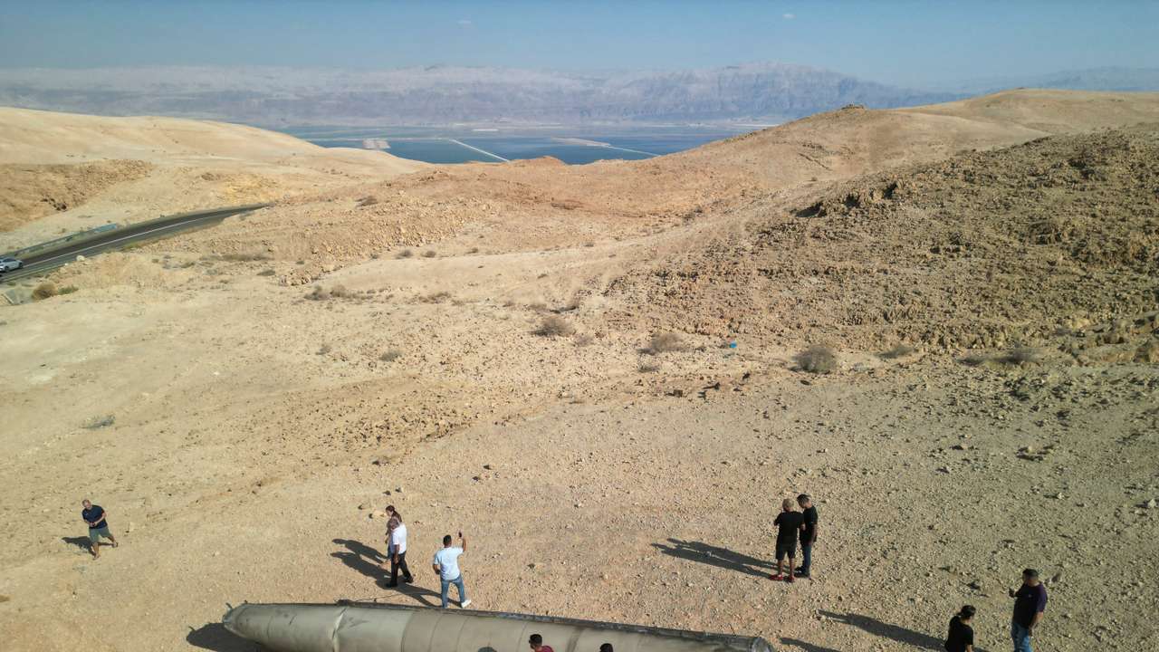 Remains of a ballistic missile lying in the desert, following an attack by Iran on Israel, near the southern city of Arad