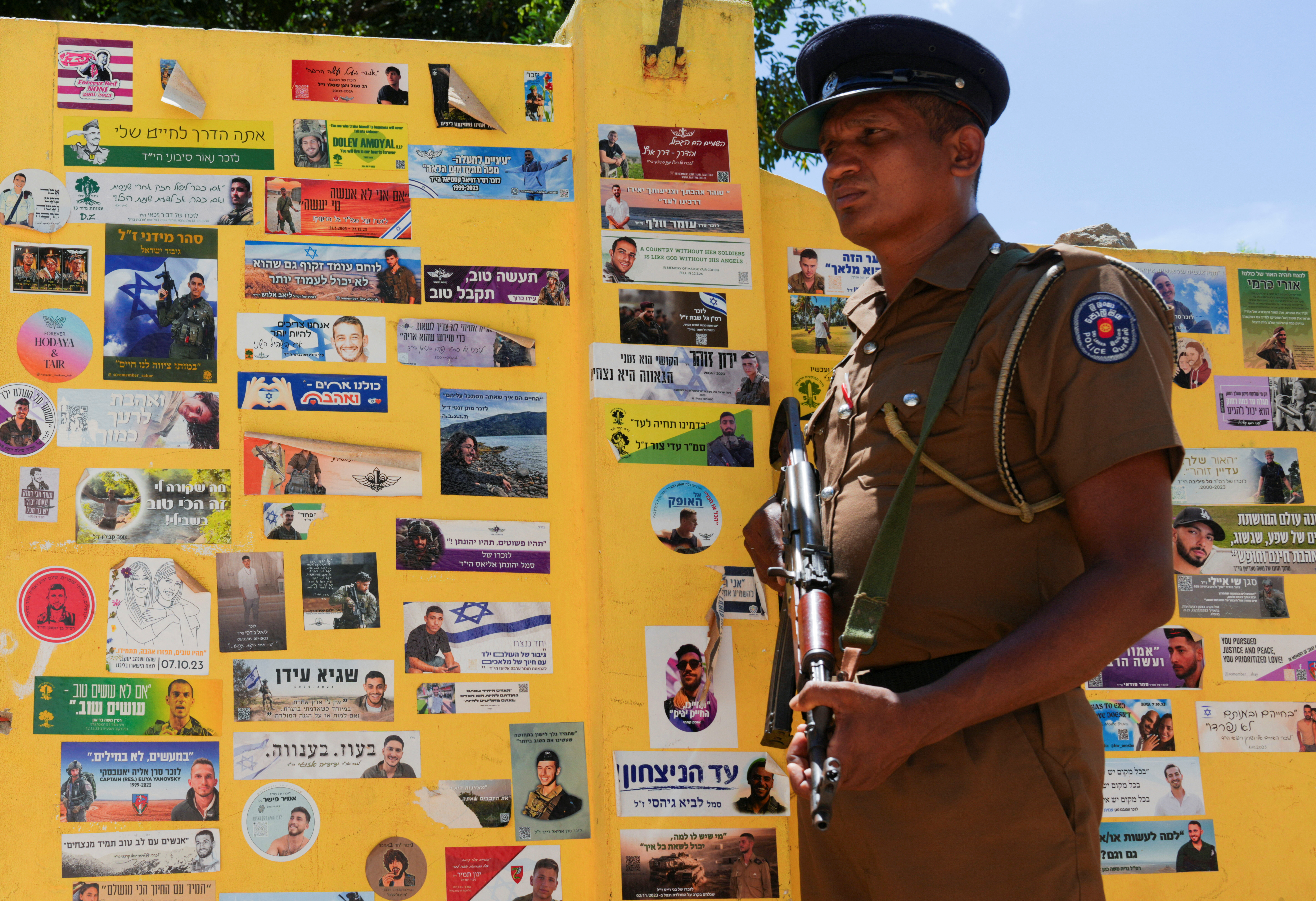 A policeman stands guard in front of the Chabad house in Arugam Bay