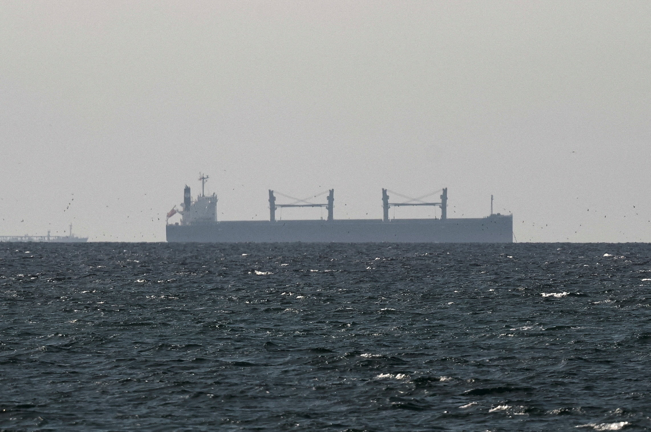 FILE PHOTO: Tankers sail in the Gulf, near the Strait of Hormuz