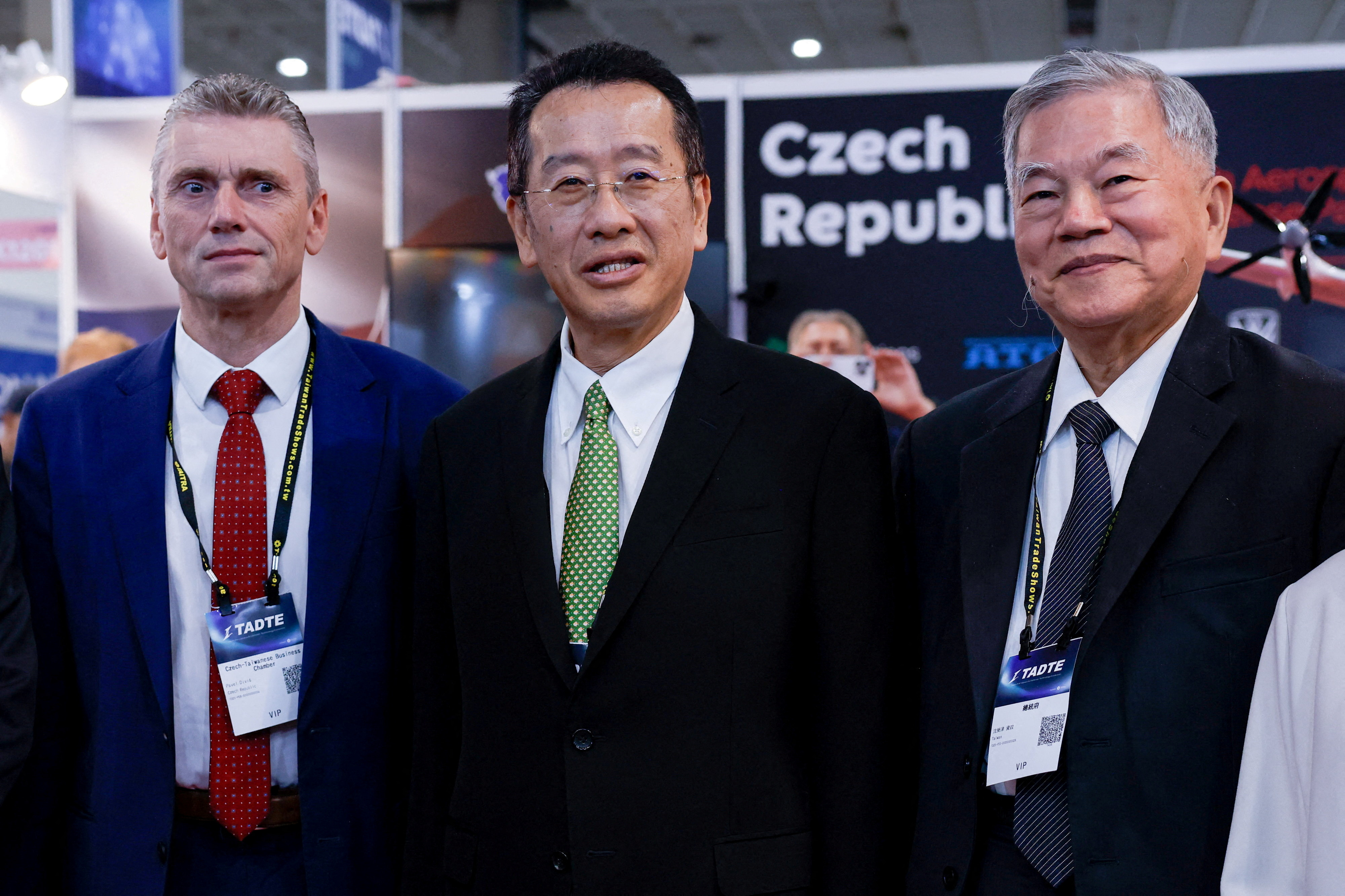 Taiwan’s Defence Minister Wellington Koo poses for photographs with delegates during the Taipei Aerospace and Defence Technology Exhibition at the Czech Republic pavilion