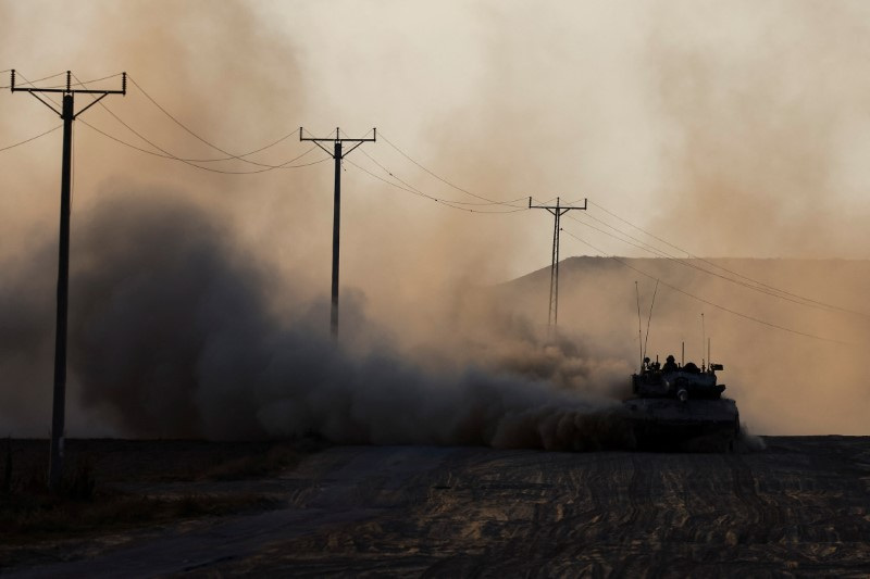 A tank manoeuvres near the Israel-Gaza border