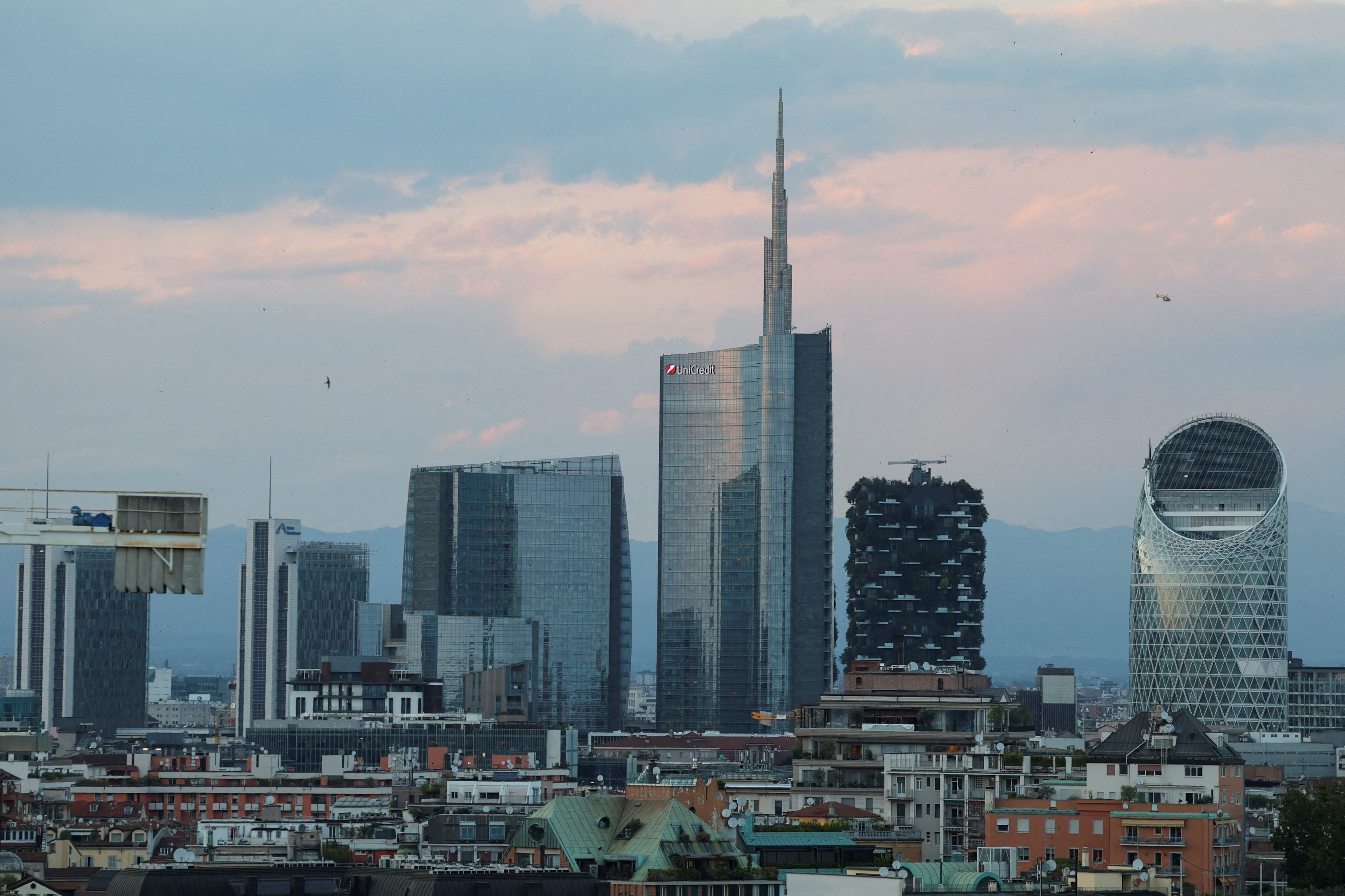 FILE PHOTO: A view shows Milan's skyline during sunset in Milan