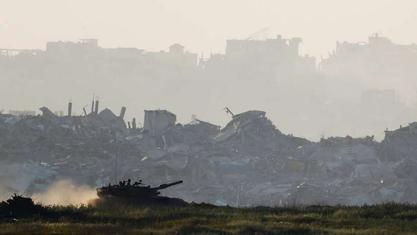A tank manoeuvres inside Gaza, as seen from Israel's border with Gaza