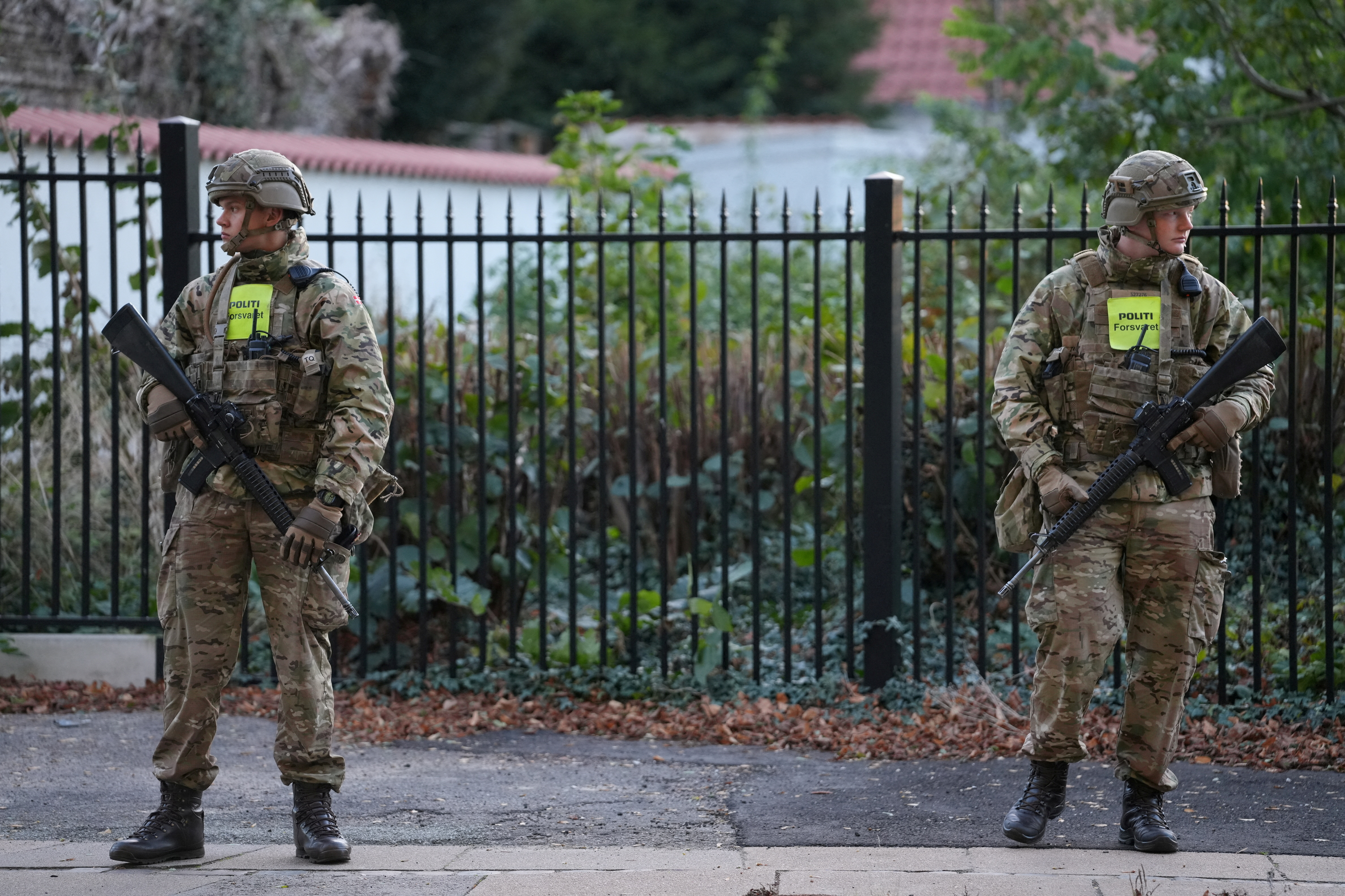 FILE PHOTO: Police officers investigate two blasts near Israel's embassy in Copenhagen