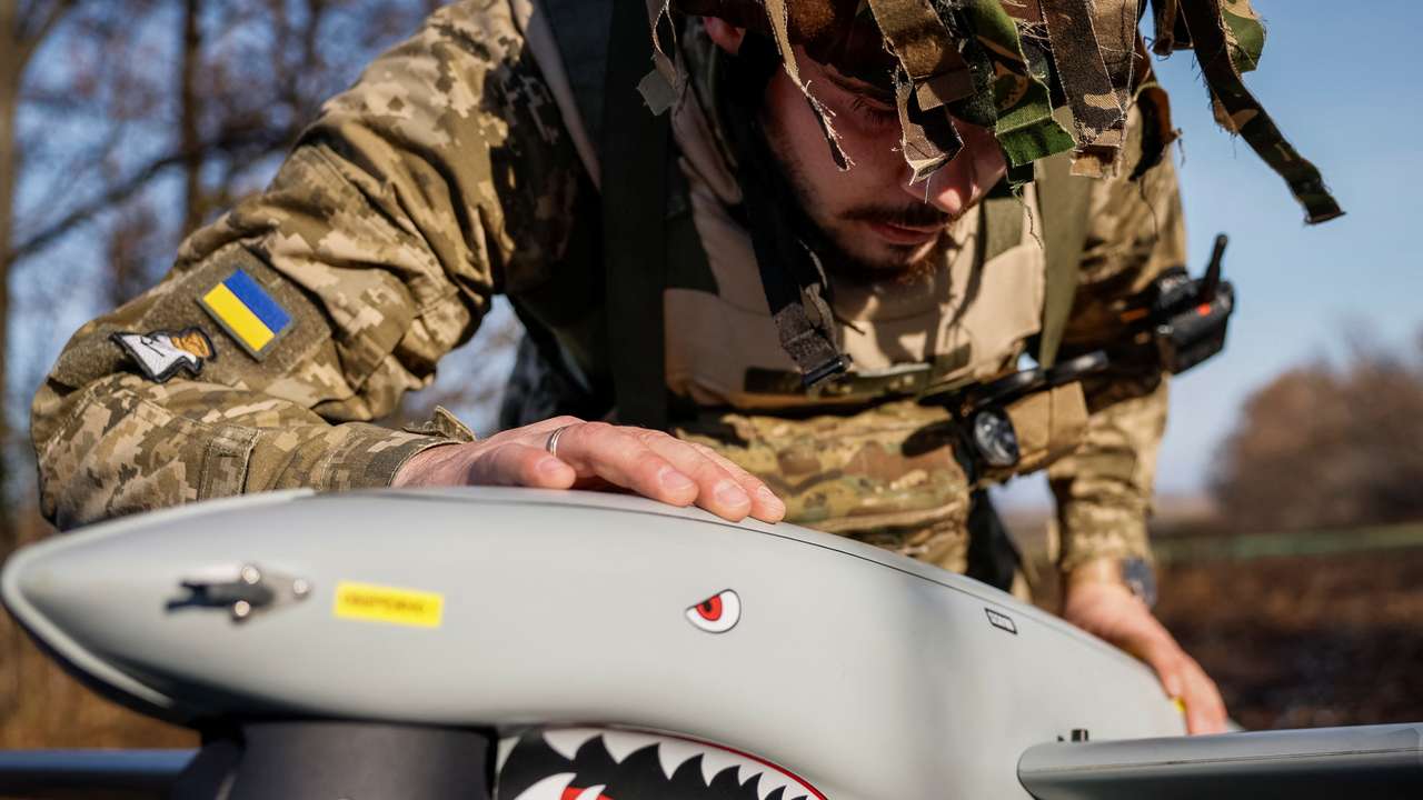 Serviceman checks the Shark drone before launching in Kharkiv region