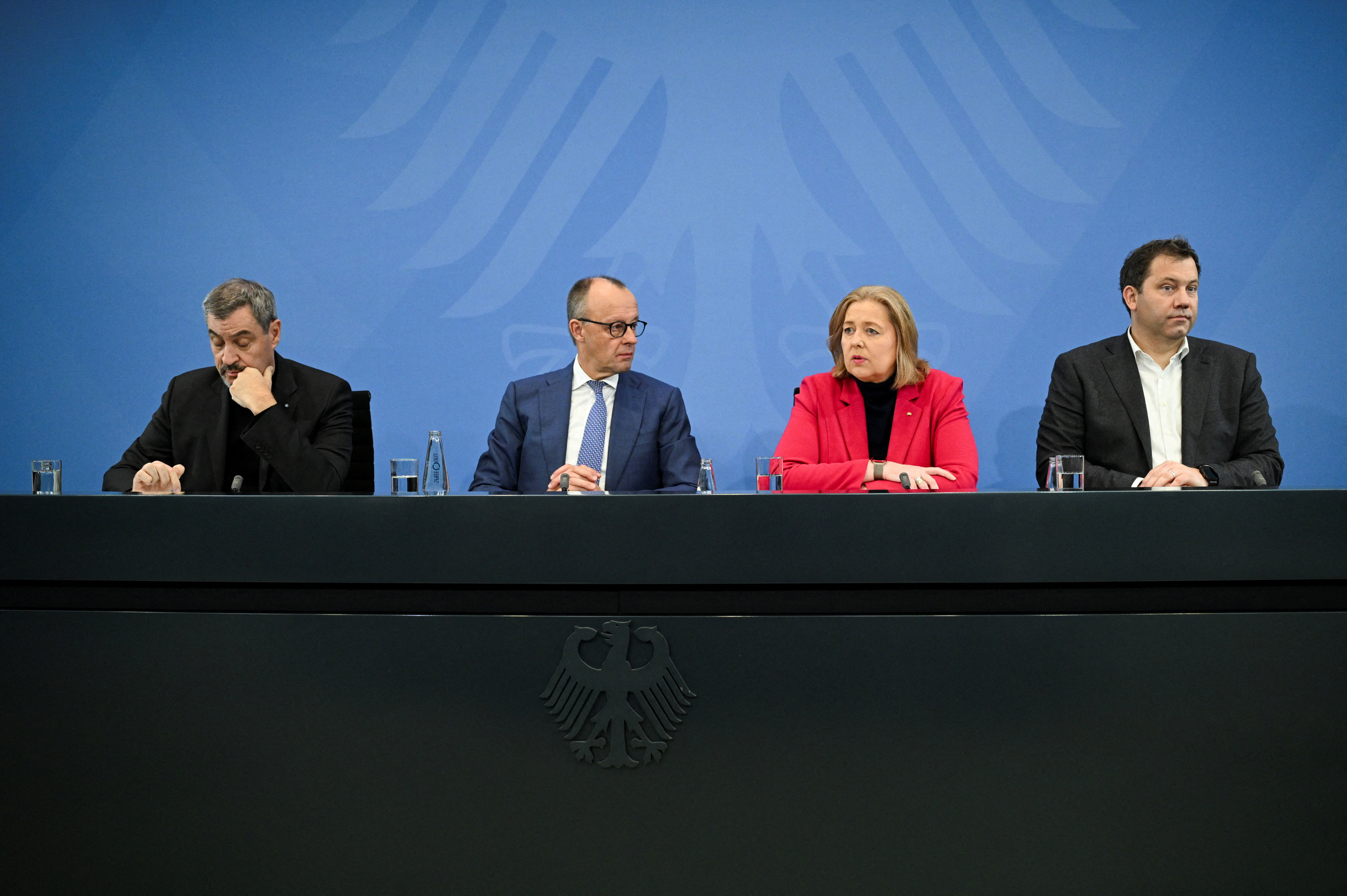 Germany's Merz and coalition leaders attend a press conference following talks, in Berlin