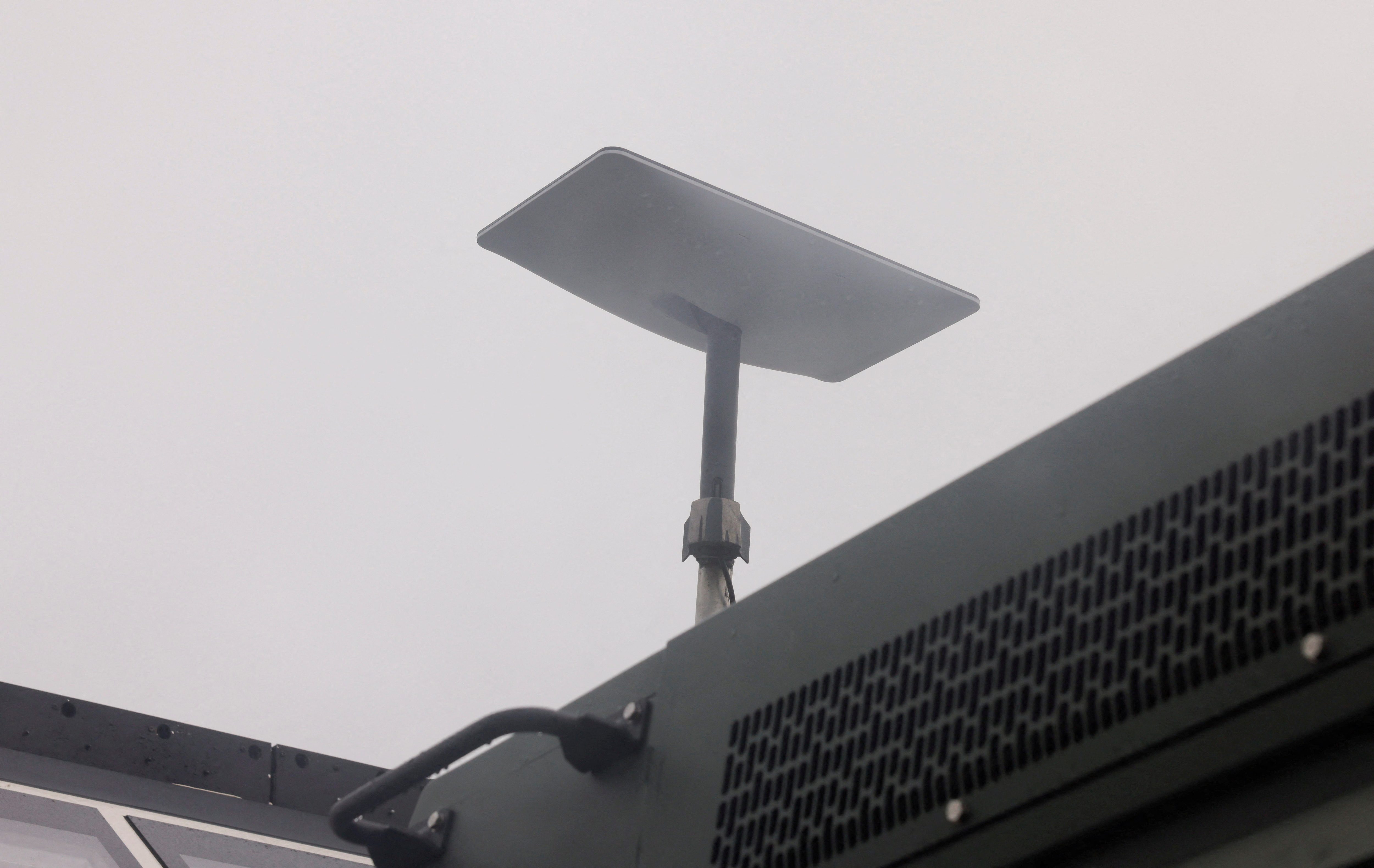 FILE PHOTO: A Starlink satellite internet system is set up on a caravan truck of a tourist, parked in a street in Ronda