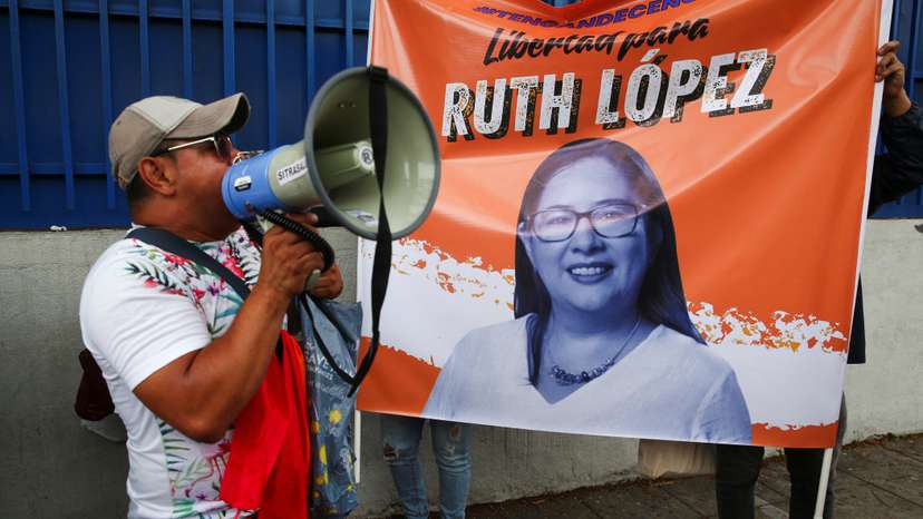 Supporters of Ruth Lopez, anti-corruption and justice director of Cristosal, protest in San Salvador