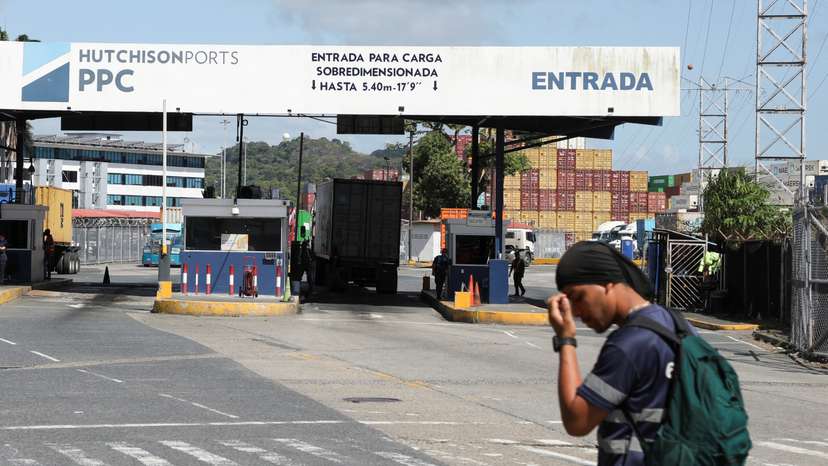 A worker walks past the port gate of Panama Ports Company (PPC)