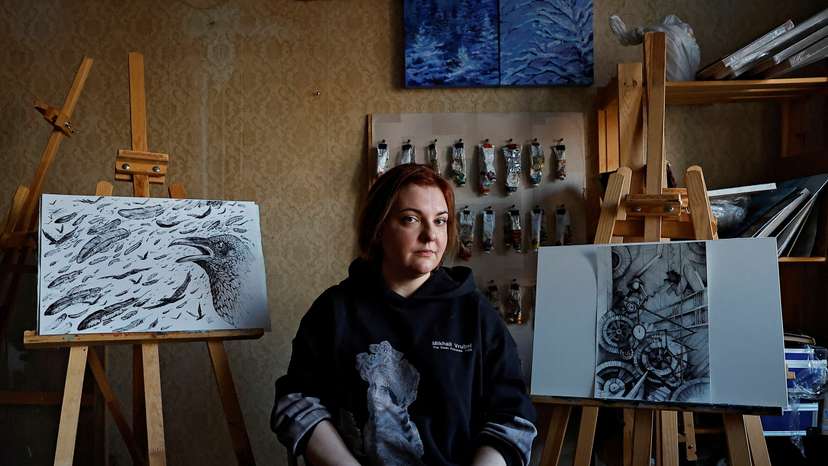 A survivor of the concert hall attack attends an interview in Moscow