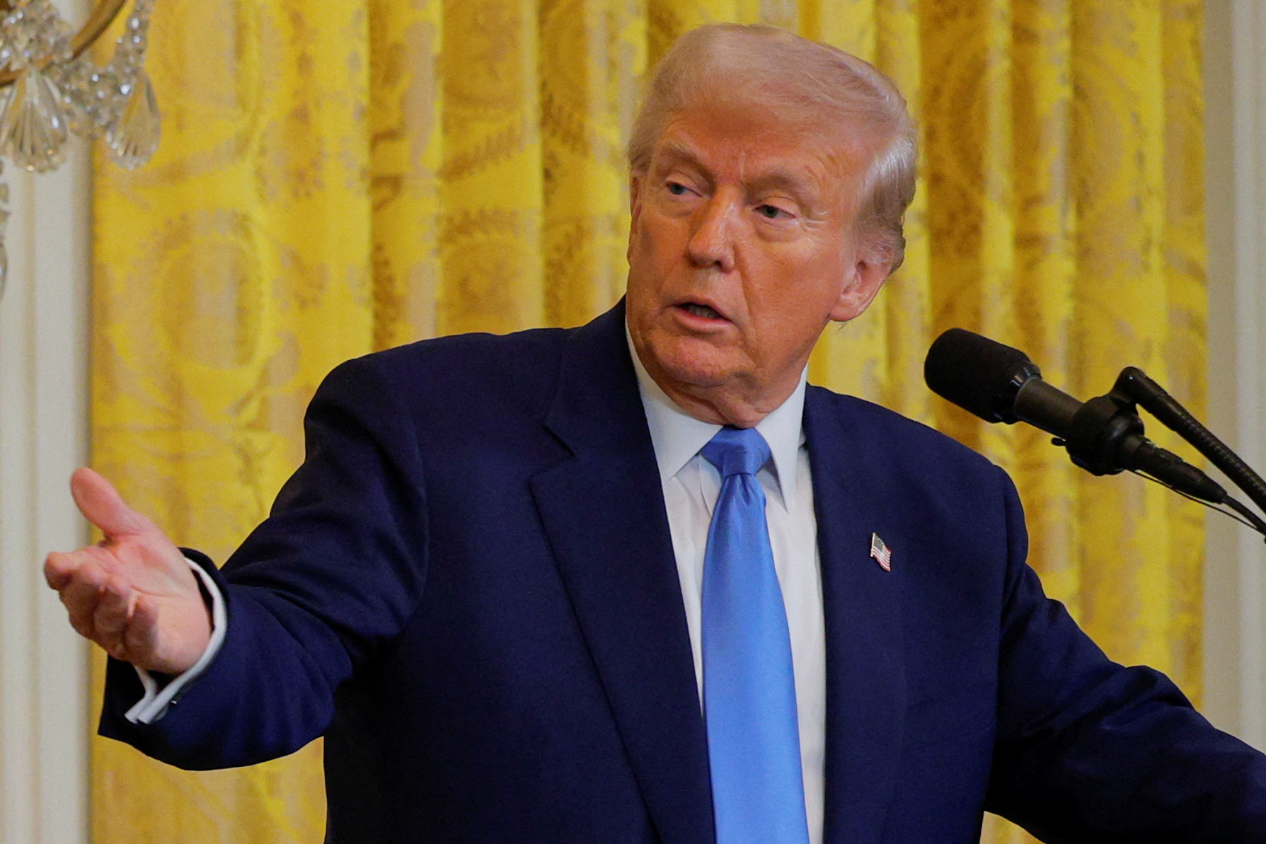 FILE PHOTO: U.S. President Donald Trump and French President Emmanuel Macron attend a press conference at the White House in Washington