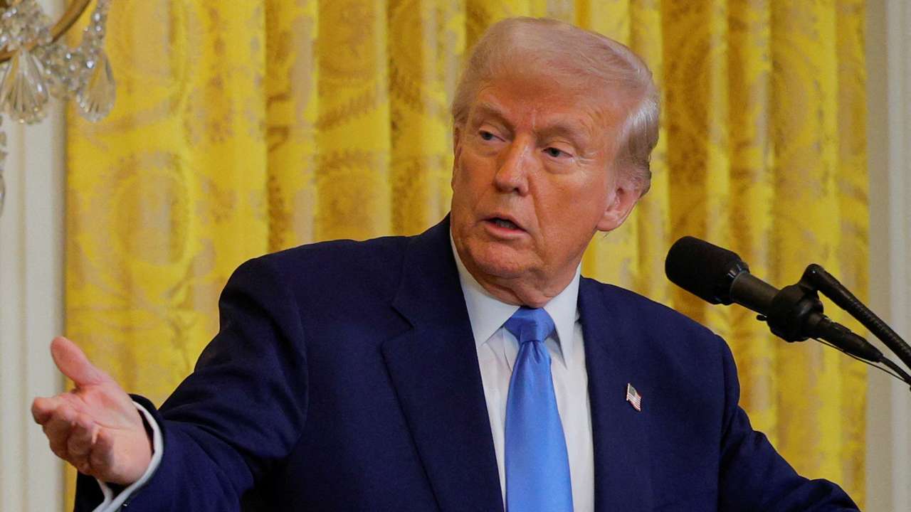 FILE PHOTO: U.S. President Donald Trump and French President Emmanuel Macron attend a press conference at the White House in Washington