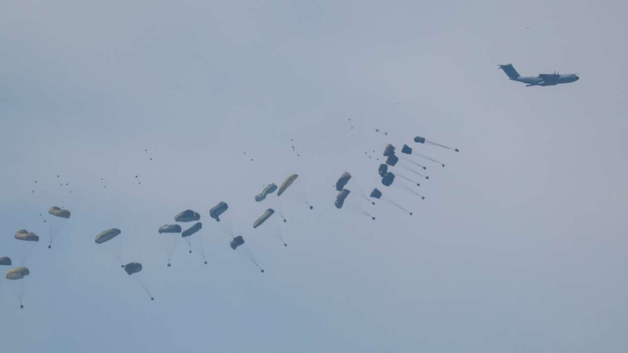 An airplane drops aid over Gaza