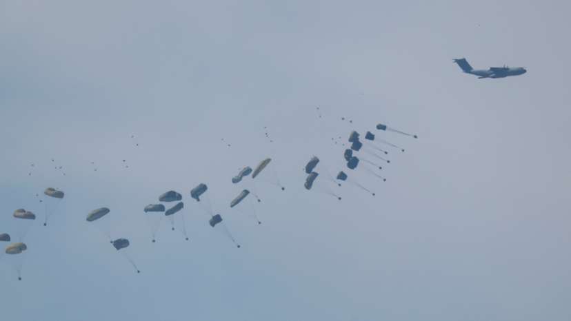 An airplane drops aid over Gaza