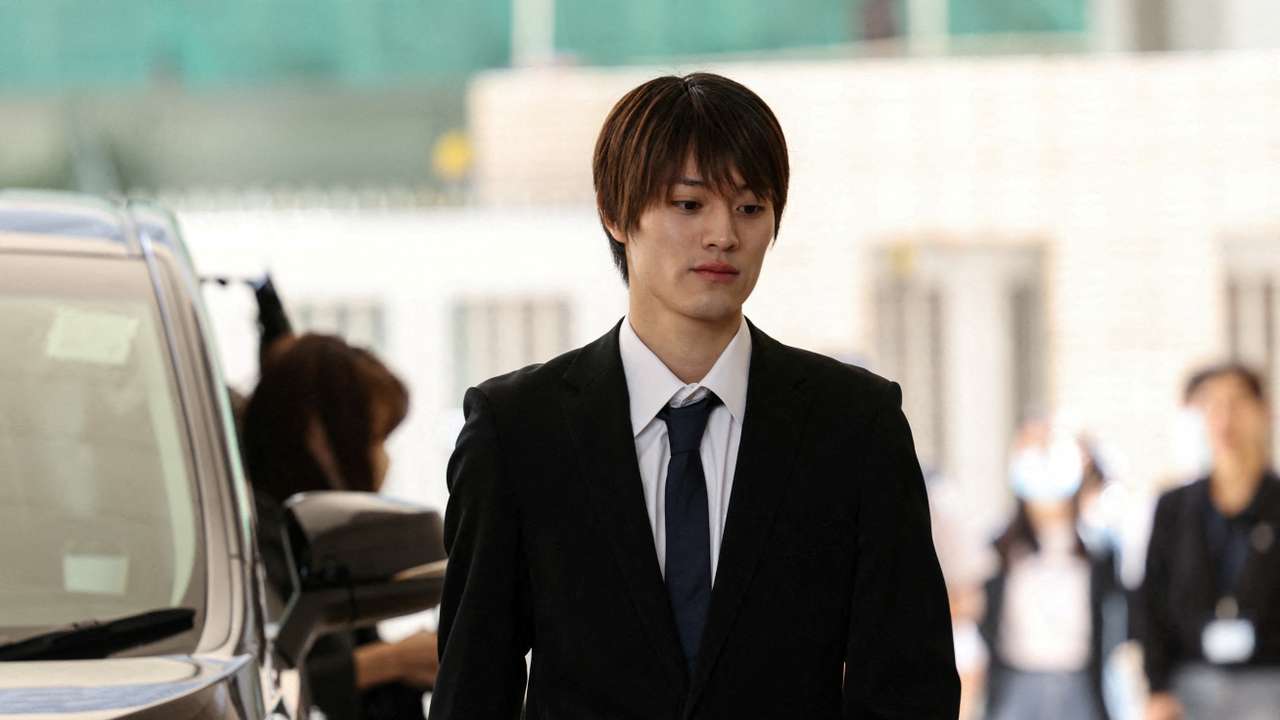 Kenshin Kamimura, a former member of the Japanese boy band ONE N' ONLY, arrives at West Kowloon Magistrates' Courts over his charge of indecent assault in Hong Kong
