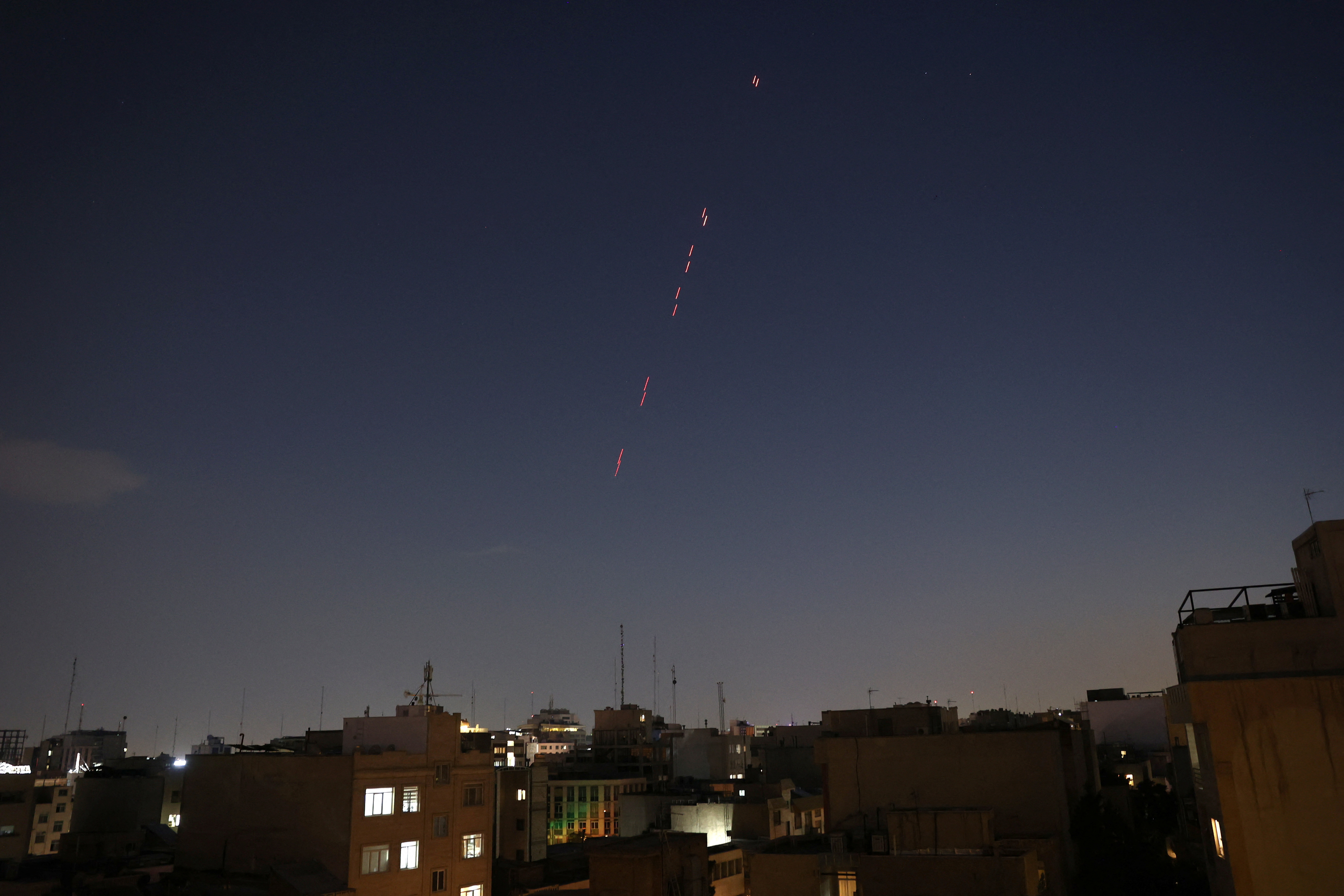 Army air defence firing is seen following the Israeli strike in Tehran