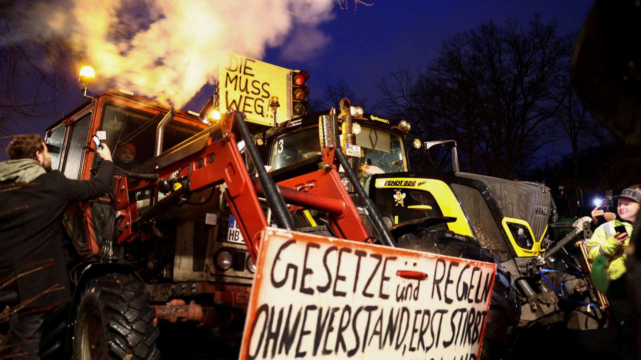 German farmers prepare for a protest against the cut of farm vehicle tax subsidies in Berlin