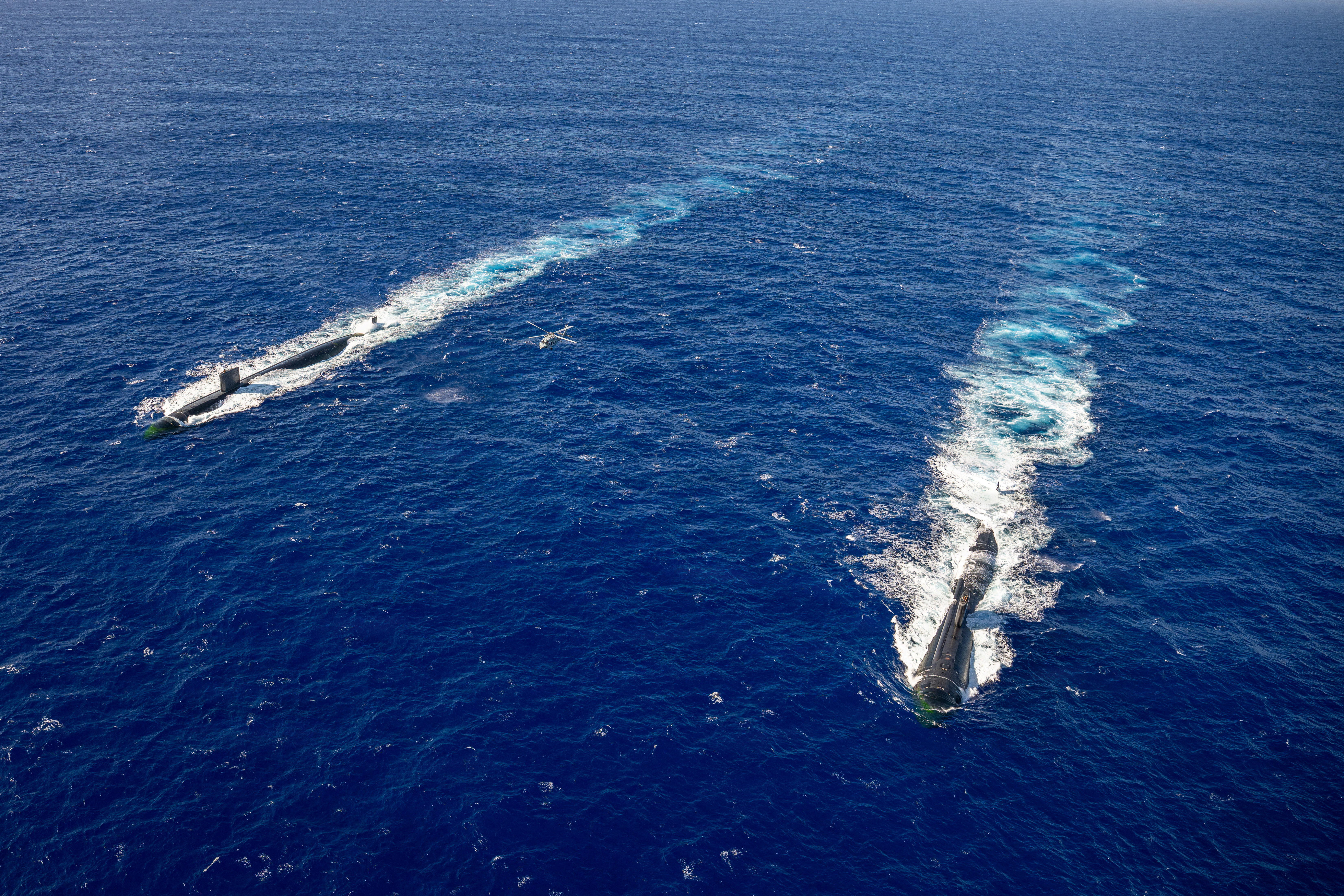 USS Asheville (SSN 758) and USS Annapolis (SSN 760) conduct photo exercise off the coast of Guam