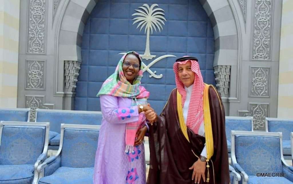 Olivia Rouamba of Burkina Faso greeting Mazin Hamad of Saudi Arabia