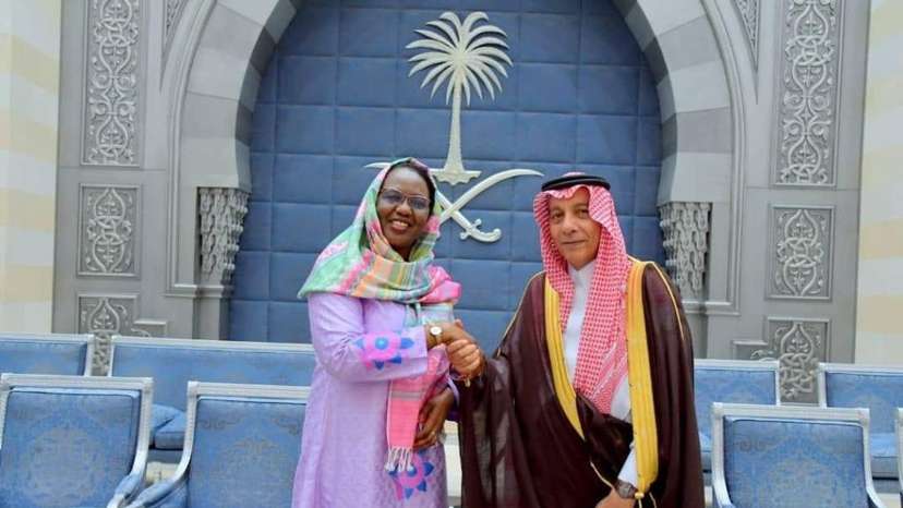 Olivia Rouamba of Burkina Faso greeting Mazin Hamad of Saudi Arabia