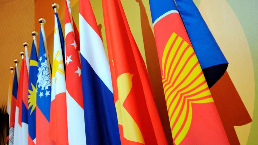 FILE PHOTO: The Association of Southeast Asian Nations (ASEAN) flag leads the flags of the 10-member countries during the ASEAN Regional Forum meeting in Singapore