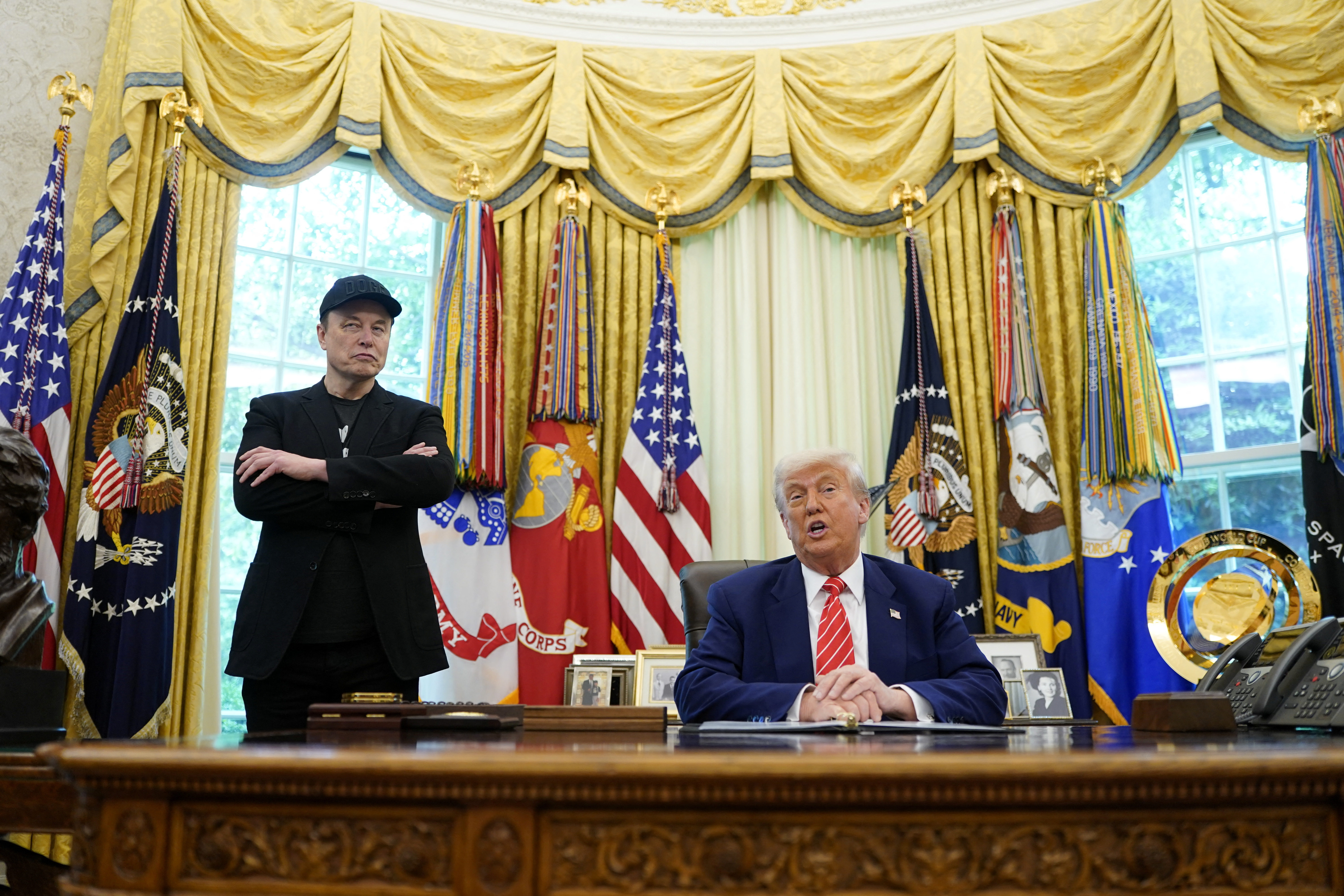 U.S. President Donald Trump and Elon Musk attend a press conference at the White House