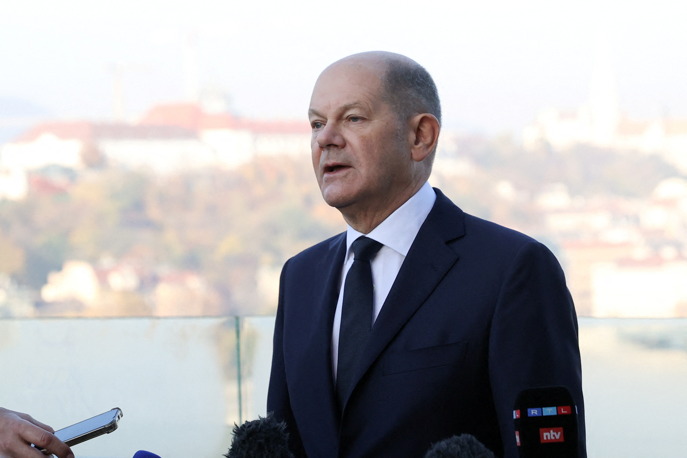 German Chancellor Olaf Scholz addresses media ahead of an informal EU summit