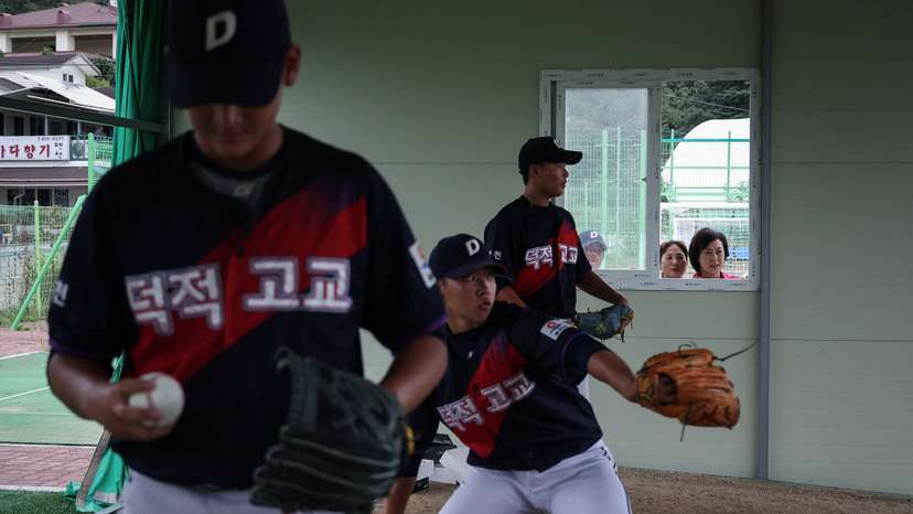 The Wider Image: South Korea island is a field of dreams for young baseball hopefuls