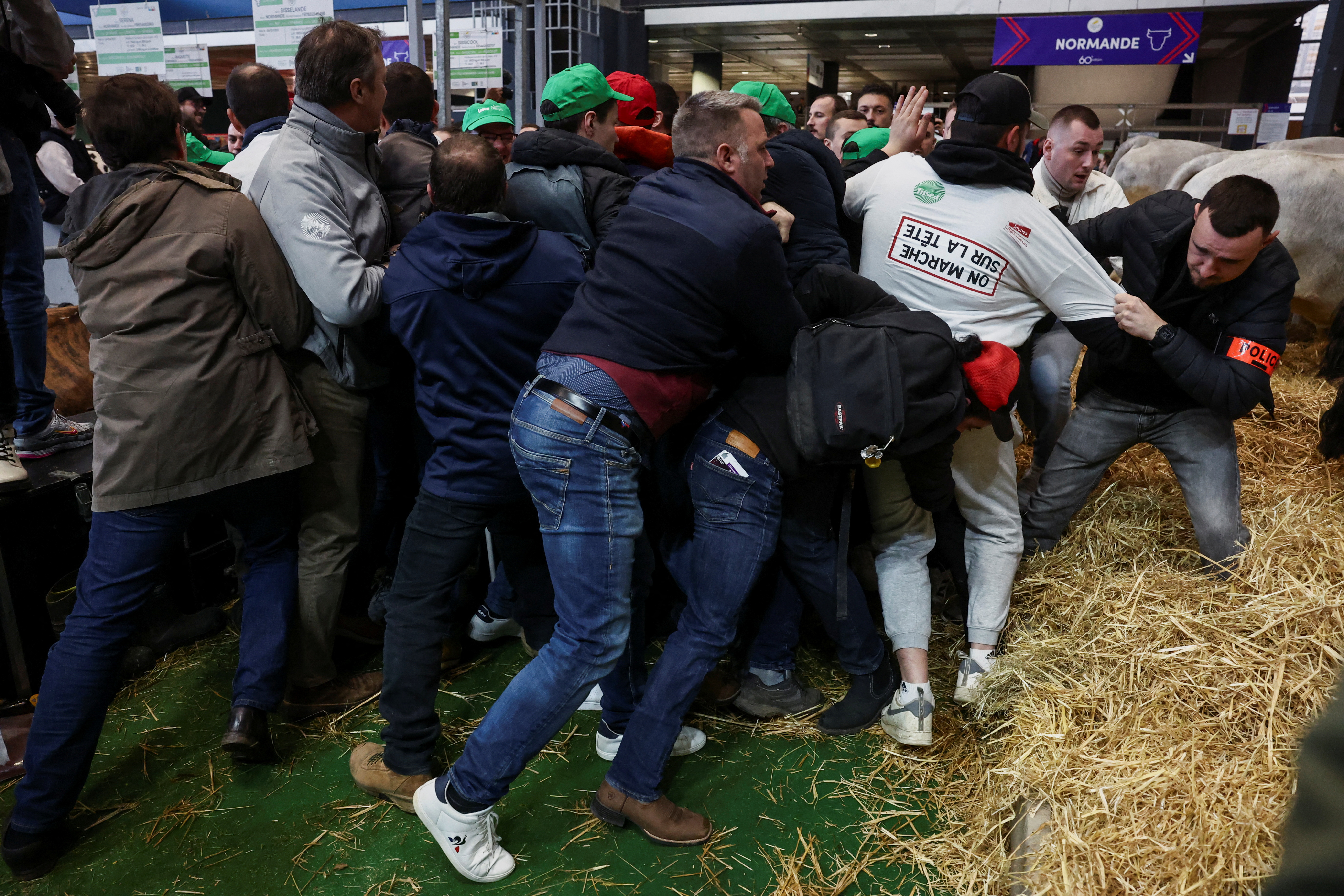 Farmers protest during the opening of Paris International Agricultural Show