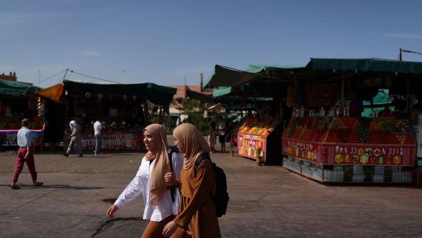 People walk in Jemaa el-Fnaa square, in Marrakesh