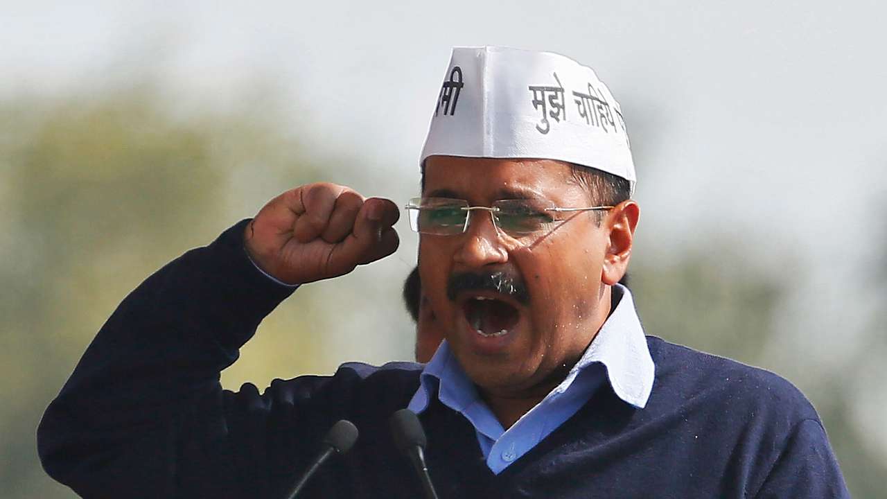 FILE PHOTO: Kejriwal, chief of AAP, addresses his supporters after taking the oath as the new chief minister of Delhi during a swearing-in ceremony at Ramlila ground in New Delhi