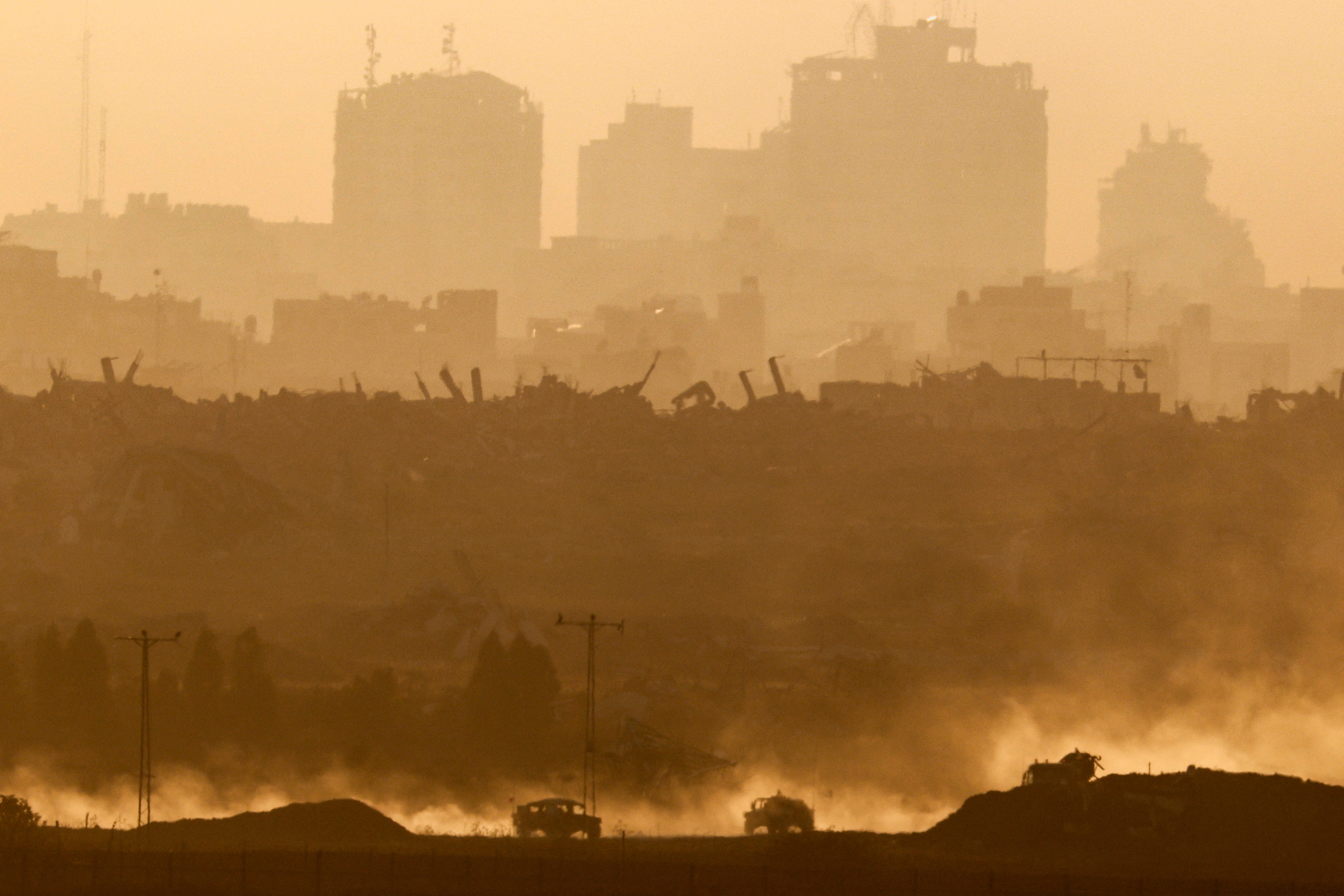 Military vehicles manoeuvre in Gaza